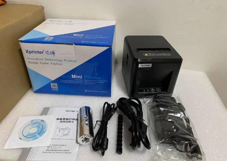 Xprinter mini thermal receipt printer with accessories, sold and installed by Zel-Tech Hub
